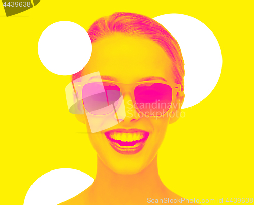 Image of happy amazed teenage girl in sunglasses