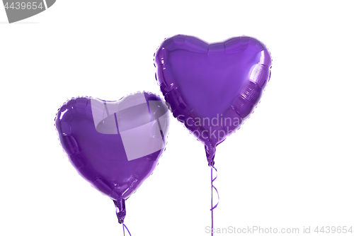 Image of close up of helium balloons over white background