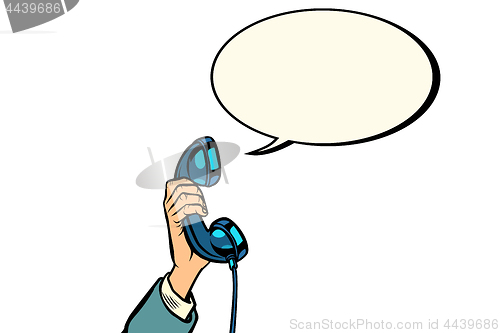 Image of retro phone handset in male hand