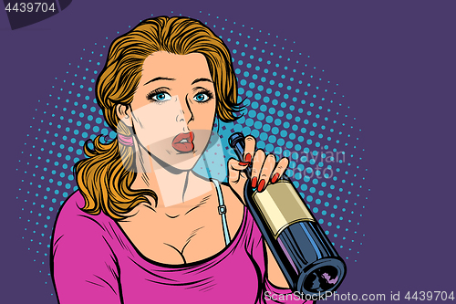 Image of Woman drinking wine from a bottle. Loneliness and sadness