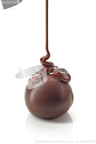 Image of chocolate truffles covered with melted chocolate