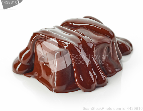 Image of piece of chocolate covered with melted chocolate