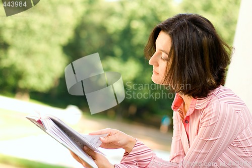 Image of woman with book