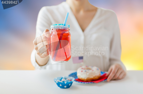 Image of woman celebrating american independence day