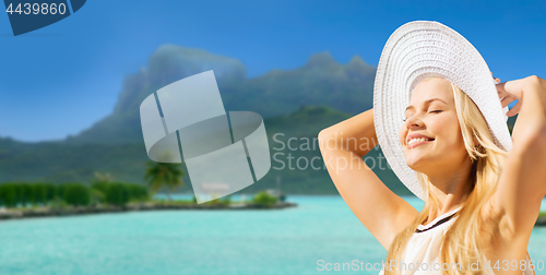 Image of beautiful woman enjoying summer bora bora beach