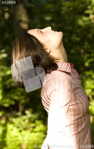 Image of woman looking upwards