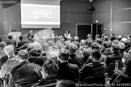 Image of Business speaker giving a talk at business conference event.