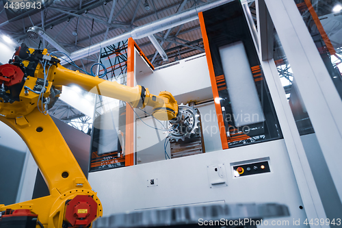 Image of Robotic Arm modern industrial technology. Automated production c