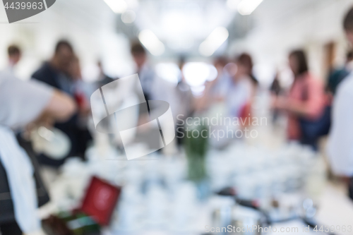 Image of Blured image of businesspeople at coffee break at conference meeting.