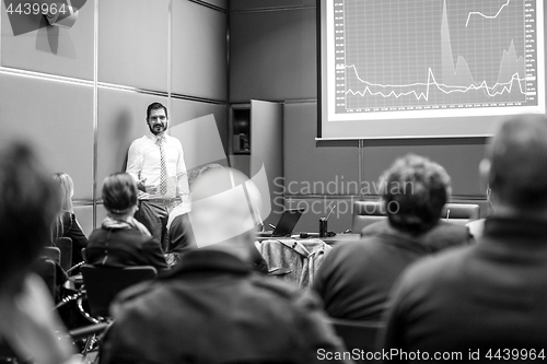 Image of Skiled Public Speaker Giving a Talk at Business Meeting.