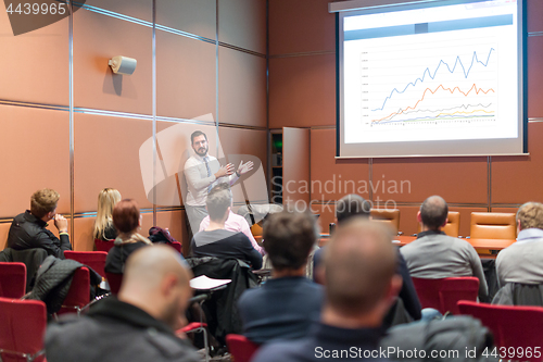 Image of Audience in conference hall listening to presentation on business conference.