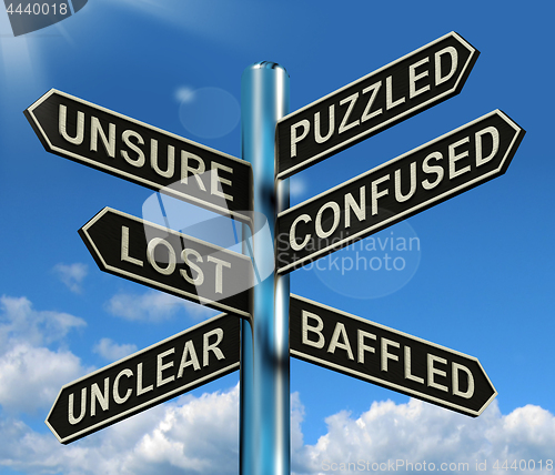 Image of Puzzled Confused Lost Signpost Showing Puzzling Problem