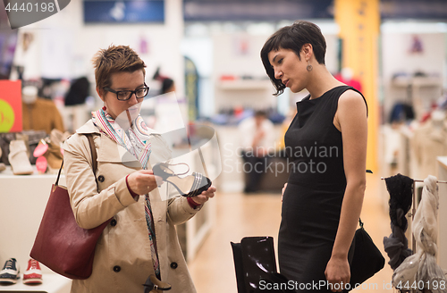 Image of best friend shopping in big mall