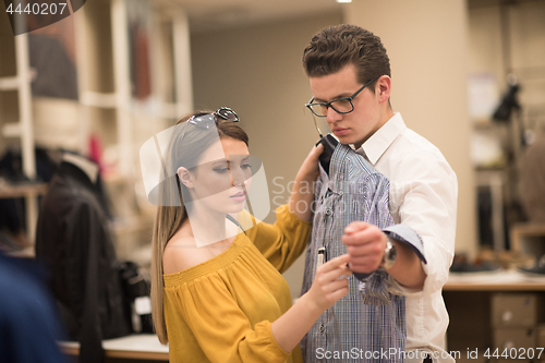 Image of couple in  Clothing Store