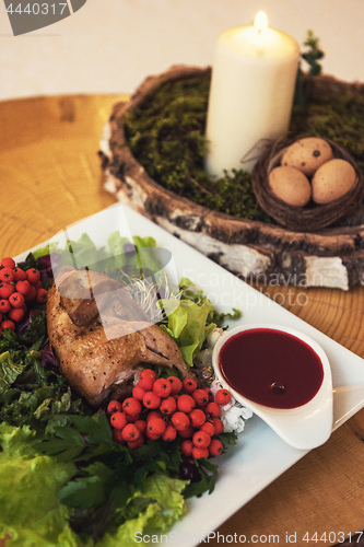 Image of quail roasted with sweet and sour cranberry sauce