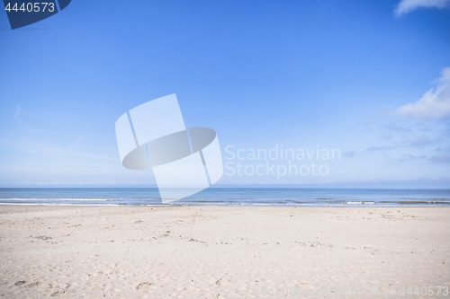 Image of Empty beach by the sea in the summer