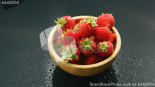 Image of Small bowl of fresh red strawberry