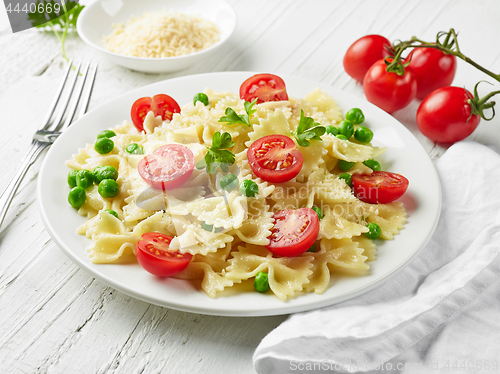 Image of plate of pasta with cheese and vegetables