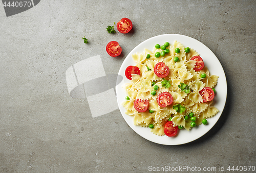 Image of plate of pasta with cheese and vegetables