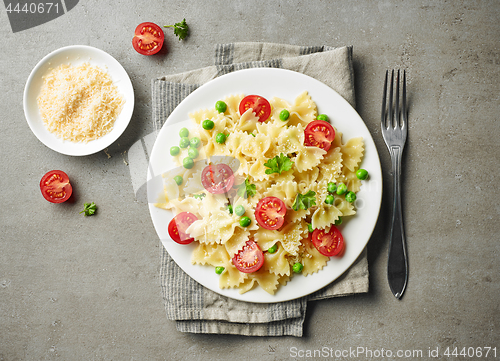 Image of plate of pasta with cheese and vegetables