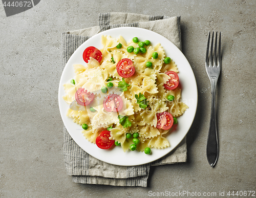 Image of plate of pasta with cheese and vegetables