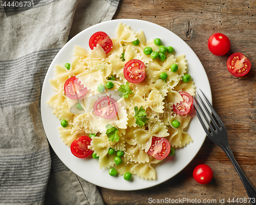 Image of plate of pasta with cheese and vegetables