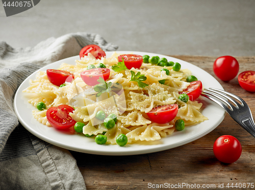 Image of plate of pasta with cheese and vegetables