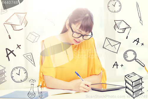 Image of asian woman student with tablet pc at home