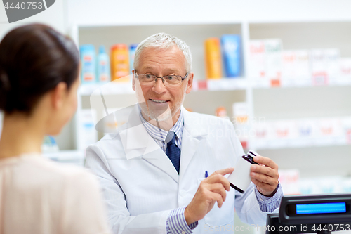 Image of apothecary with cure and customer at pharmacy