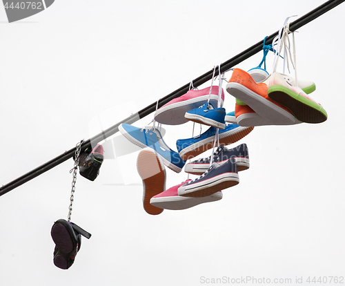 Image of boots on a rope