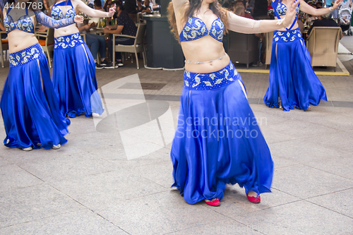 Image of Four Women dancing Belly oriental dance on the street