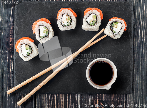 Image of Philadelphia Sushi roll on shale stone