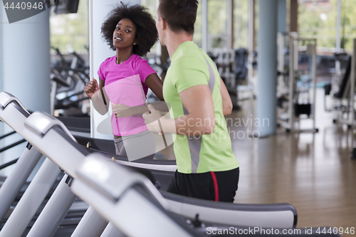 Image of people exercisinng a cardio on treadmill