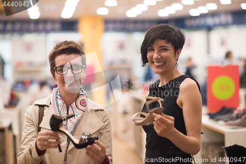 Image of best friend shopping in big mall