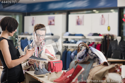 Image of best friend shopping in big mall