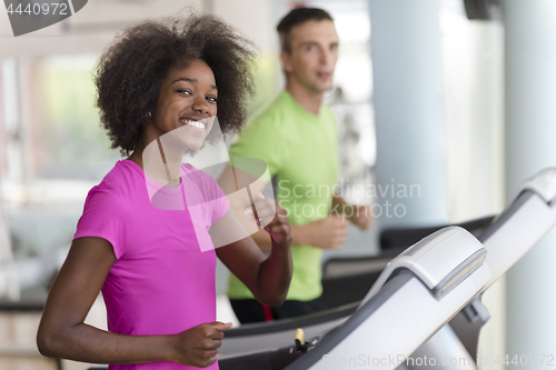 Image of people exercisinng a cardio on treadmill