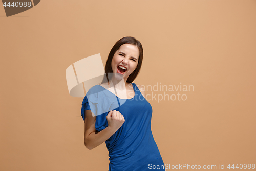 Image of Winning success woman happy ecstatic celebrating being a winner. Dynamic energetic image of female model