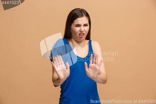 Image of Disgust woman with thoughtful expression making choice against pastel background