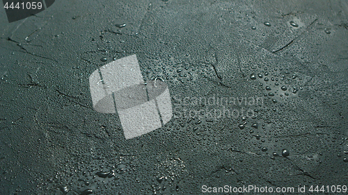 Image of Wet stone surface in drops