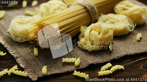 Image of Spaghetti of different kind on napkin