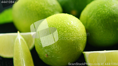 Image of Bright limes with water drops 