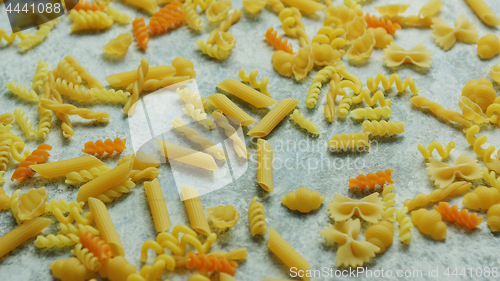 Image of Different macaroni laid in disorder