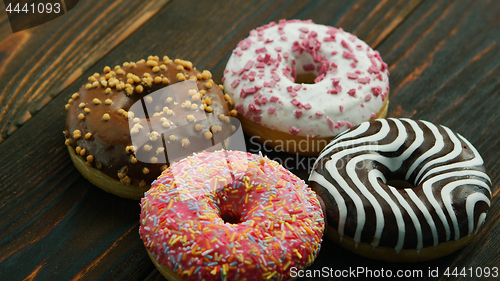 Image of Sweet donuts with different glazing 