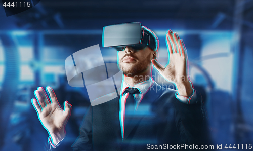 Image of businessman in virtual reality headset