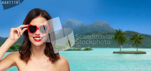 Image of woman with sunglasses over bora bora beach