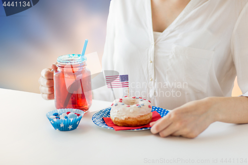 Image of woman celebrating american independence day