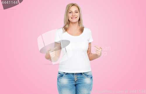 Image of woman in white t-shirt pointing fingers to herself