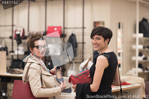 Image of best friend shopping in big mall