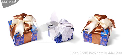 Image of gifts packing tied by ribbon