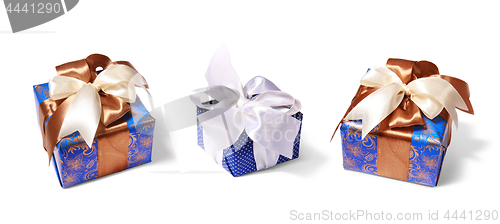Image of gifts packing tied by ribbon